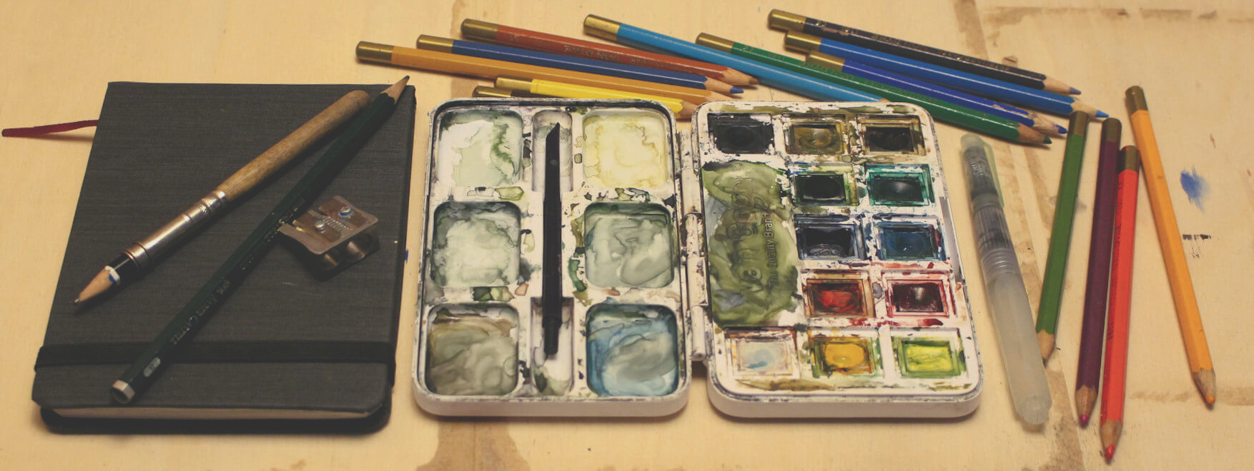 materials: sketchbook, colored pencils, watercolor set and pocket brush