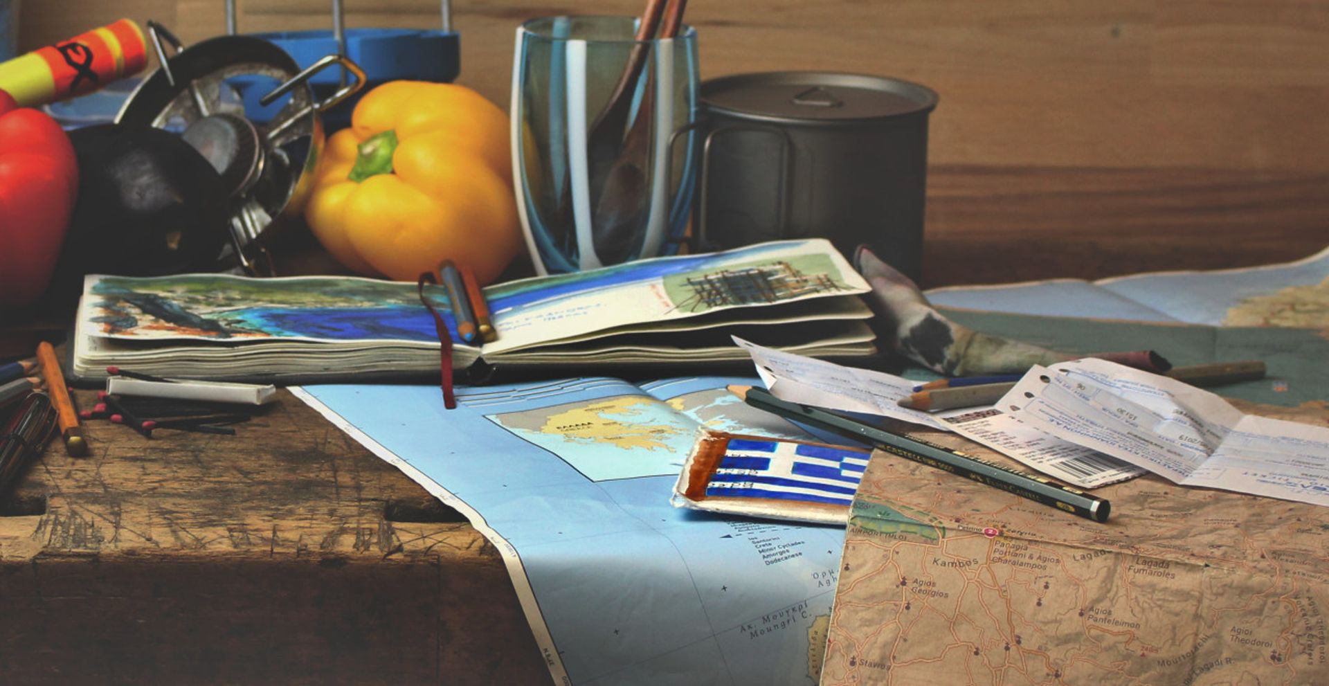 Maps of Greece, paprika, pencils and the sketchbook